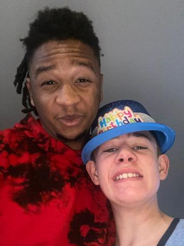 A man and woman posing for the camera.