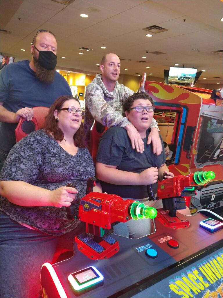 A group of people playing video games together.