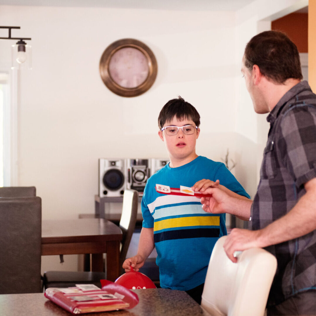 A man and boy in the living room